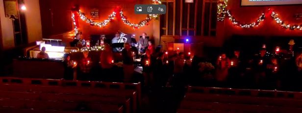 PVURC 2025 
Christmas Eve Candlelight Service - Close-up view of the front of the sanctuary.